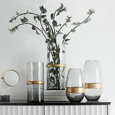 Beautiful italian vases in stone, metal, ceramic, wood, glass and polymers. Copper Ring Glass Vase Flower Vases Glass Flower Vases Vase