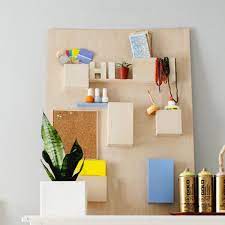 In this diy, you'll learn how to make a modern wall organizer using simple materials such plywood and cork. Diy This 328 Anthropologie Wall Organizer For Less Than 50 Brit Co