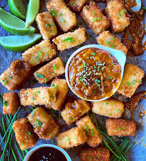 Diane Morrisey S Crispy Marinated And Pan Fried Tofu Nuggets With Creamy Peanut Sauce And Soy Sesame Sauce In 2020 Tofu Cooking Dinner Whole Food Recipes