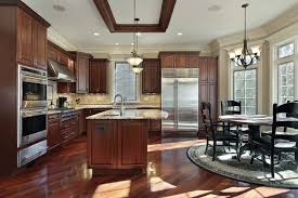 The original kitchen and family room wing included a rabbit warren of small rooms with an awkward angled family room separating the kitchen from the formal spaces. Cherry Cabinets What Countertops Will Pair Well Marble Com
