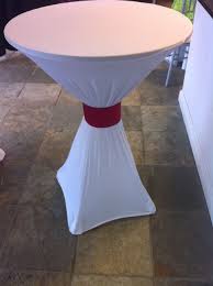 Spandex Linen On A Cocktail Table With A Decorative Cuff Cocktail Table Decor White Cocktail Tables Table Covers Wedding