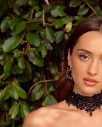 Dark romance meets runway elegance. 👄, A sculpted mermaid silhouette  adorned with tonal beading and weightless draped sleeves, this gown from  Andrea and Leo channels a modern femme fatal energy. ...