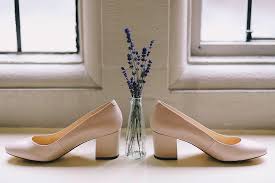 Maybe you would like to learn more about one of these? Hd Wallpaper Photo Of White Leather Chunky Heels Near Blue Petaled Flower In Clear Glass Vase Pair Of White Chunky High Heel Shoes Wallpaper Flare