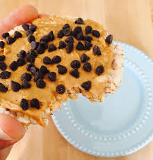 The Absolute Perfect Afternoon Delight Brown Rice Cake Topped With All Natural Peanut Butter And Mini Chocolate Chips Y Yummy Snacks Cake Toppings Rice Cakes