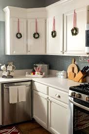 Ideas for decorating above cabinets christmas kitchen. 75 Cozy Christmas Kitchen Decor Ideas Digsdigs