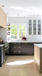 The floor matches the countertops. 52 Black And White Kitchen Cabinets Timeless Look Cabinets