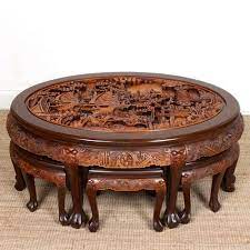 The legs have a carved lions face at the top. Chinese Coffee Table With Hand Carved Nautical Battle Scene Six Stools La220652 Loveantiques Com