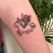 Small tattoos may be discreet but that doesnt mean they dont have a huge impact. 20 Delightful Small Cartoon Tattoos Withtatto Com