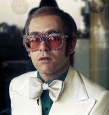 voxsartoria — The Wide Lapel Years. Elton John in Tommy Nutter,...
