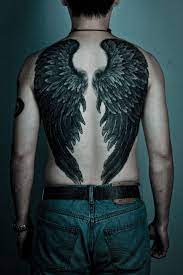 Wing tattoos can also symbolize these tattoos can be used to portray various symbolic meaning and depending on the person with the tattoo the symbolic meanings are unlimited. Male Angel Wing Tattoo On Back Novocom Top
