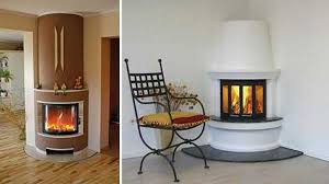 While fireplaces are traditionally not positioned above any existing furniture, you can opt for a modern corner fireplace which fits neatly half way up the wall. Corner Fireplaces Offering Unique Decorative Accents For Space Saving Interior Design Corner Fireplace Freestanding Fireplace White Corner Electric Fireplace