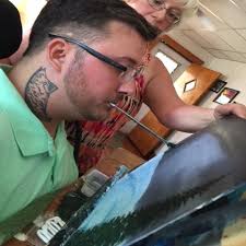 West Virginia man makes artful statement painting with his mouth