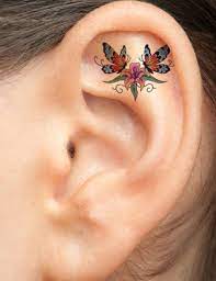 Two Butterflies On Flower Ear Tattoo Tattoomodels Tattoo Ear Tattoo Neck Tattoo Inner Ear Tattoo