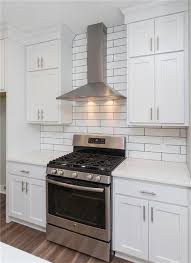 Misterio Quartz With Large White Subway Tile Grey Grout White Subway Tile Kitchen White Subway Tiles Kitchen Backsplash Kitchen Remodel