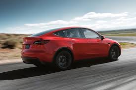 The driver and front seat passenger can control all of the car's. Tesla Model Y Deliveries Begin Ahead Of 2022 Uk Debut Autocar