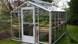 A starter greenhouse or a grower? Backyard House Small Backyard Greenhouse For The Home Gardener