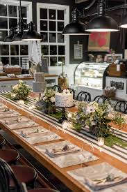 Rehearsal Dinner At The Baker S Table At Cork Factory Hotel Lancaster Pa Flowers By Petals Wi Bakers Table Marble Tables Design Marble Tables Living Room