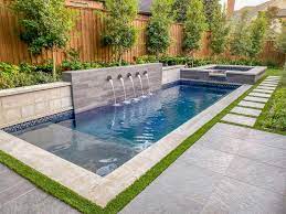The rectangle was one of the most common shapes in early pool design. Rectangle Pool Entry Designs Long Side Google Search Backyard Pool Landscaping Pools Backyard Inground Small Backyard Pools
