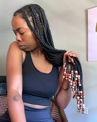 Essentially, the woman is braiding the hair, putting the hair up in a bun or chignon, or using weaves so that the hair doesn't cause any more breakage on the ends, hence the word protective. Protective Hairstyles For Natural Hair Beauty All The Pretty Birds