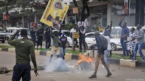 Supporters cheer bobi wine, center, as he departs from a service at the namungoona orthodox church in kampala on sunday. Uganda Restless After Bobi Wine S Latest Arrest Death Toll Rises News Dw 19 11 2020