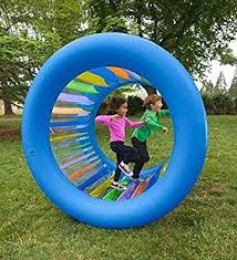 Backyard toys that'll keep your kid busy all summer long. Amazon Com Roll With It Giant Heavy Duty Colorful Inflatable Rolling Wheel Outdoor Active Play Toy In 2020 Backyard Toys For Kids Backyard Toys Outdoor Toys For Kids