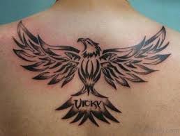 Butterfly with skull on chest with flower designs on the back. 92 Good Looking Eagle Tattoos For Back