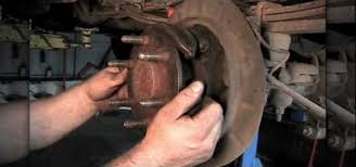 It is connected to an electrical harness that is also connected to an electrical junction box behind the brake pedal. How To Replace The One Piece Parking Brake Shoe On A Chevy Tahoe Or Silverado Auto Maintenance Repairs Wonderhowto