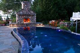 These fire pits can surround your pool, or could even be located with water on all sides of the inside of your pool. Landscaped Outdoor Living Fire Pit Ideas Simplified Drost Landscape