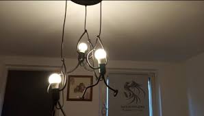 Tarzaydinlatma Climber Adamavize Tirmananadam Aydinlatma Aydinlatma Aydinlatmamodelleri Retro Avize Avizemodelleri Sarkit Aydinlatmalar Ampul Lamba
