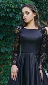 The illusion sheer bodice, allover lace, and tulle enhance this romantic look. Black Wedding Dress Long Sleeve Dress Prom Dress Long Evening Etsy Prom Dresses Long Prom Dresses Modest Prom Dresses Long With Sleeves