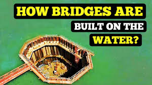 The three main methods used in the construction of bridges in water are the use of (i) battered piles, (ii) cofferdams and (iii) caissons. How Bridges Are Built Over The Water Youtube