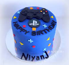 Which is the best ps4 birthday cake topper? Cakesbyzana Playstation Cake
