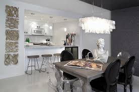 Crafted of hardwood solids, engineered wood, and veneers, the table features turned legs. Modern Dining Table Chairs For Stylish Contemporary Homes