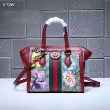 Gucci has amassed a worldwide following of fashion aficionados who follow their product launches and routinely purchase their products, including gucci. Gucci Gg Women Ophidia Gg Flora Small Tote Bag In Beige Ebony Gg Supreme Canvas Lulux