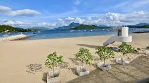大埔龍尾泳灘 lung mei beach 航拍龍尾灘 全港第二個人工沙灘 200米長 護沙堤 大尾篤 大埔工業邨 汀角路 船灣海 船灣淡水湖 日落打卡, 大埔龍尾泳灘 率先睇丨耗資近3億興建丨全港第二人工沙灘丨交通泊車收費及設施分享. N Wsptqn Veism