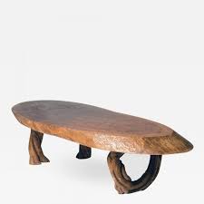 A custom coffee table is a great way to make a unique statement and show off your diy skills this rustic coffee table is not only easy to build but it's made entirely of upcycled materials. Tree Slice Coffee Table With Feet Made Of Liana