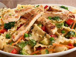 According to olive garden, in 2018, the italian restaurant will serve vegetarian pasta that includes a mix of zucchini and squash noodles combined with whole grain linguine, tomatoes, and garlic scampi herb sauce. What Dietitians Order At Olive Garden