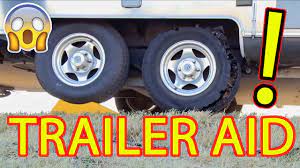 You pull the good tire up onto trailer aid plus to raise the flat tire up 5.5 inches for changing. Trailer Aid Tire Changing Ramp Youtube