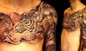 The small rip tattoo on the male upper chest is the best symbol of memory. Photo From Chronic Ink Tattoo Shop Portfolio Gallery Tattoos Ink Tattoo Arm Sleeve Tattoos