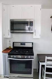 Just be careful about what you put in the cabinet since it will get warm from the stove. Installing An Over The Range Microwave