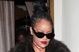 Photo by darrian traynor/getty images. Rihanna Is Glam In A Minidress Fur Coat Sleek Heels With A Ap Rocky Footwear News