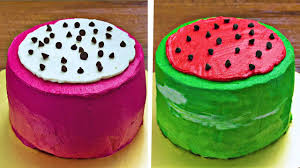 Using flat slide of decorating tip, pipe pale green frosting along edge of dark green frosting on sides and top. Watermelon Cake Decoration Ideas Diy Quick And Easy Recipes Hoopla Recipes Kidztube