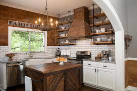 The handmade chandelier adds a sense of movement to the room, which also features a custom dining table, swivel chairs by koi, and a painting by allen anthony hansen. The Benefits Of Open Shelving In The Kitchen Hgtv S Decorating Design Blog Hgtv