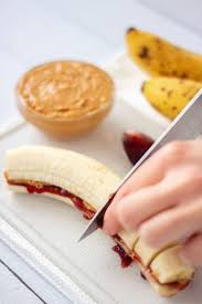 Peanut Butter Jam Banana Sandwich Recipe Peanut Butter Jelly Banana Food Snacks