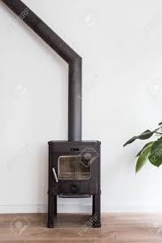 Morsø 3450 is a radiant stove that comes with scandinavian soapstone sides for enhanced heat morso 7110 wood stove. Iron Fireplace Like A Stove In A House With Fire Scandinavian Stock Photo Picture And Royalty Free Image Image 110885219