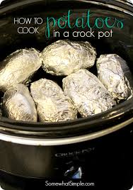 The Easiest Crock Pot Baked Potatoes Ever Recipe How To Cook Potatoes Crockpot Dishes Cooking