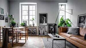 Airy, floral curtains separate the bed from the rest of the apartment. Applying Scandinavian Small Apartment Design Along With Contemporary Interior Ideas Makes You More Clever In Decorating Roohome