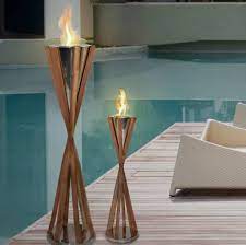 Commercial patio heaters have a higher btu (british thermal unit) capacity and use ng or propane as fuel. The Best Fire Columns Outdoor Fire Pit Alternative Apartment Therapy