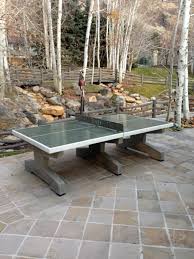 I've talked her into letting me build a concrete ping pong table that will double as an outdoor dining space. Outdoor Concrete Game Table Ideas