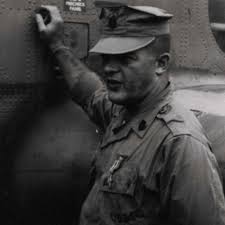 U.S. Marine Gunnery Sergeant Donald Beaver, 32 (Selinsgrove, Pennsylvania),  points to the place where his CH-46 “Sea Knight” helicopter broke apart  upon crashing, September 2. The former drill instructor was awarded a